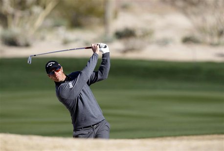Nicolas Colsaerts of Belgium watches his second shot on the 7th hole during the third round of the WGC-Accenture Match Play Championship gol Nicolas Colsaerts of Belgium watches his second shot on the 7th hole during the third round of the WGC-Accenture Match Play Championship gol
