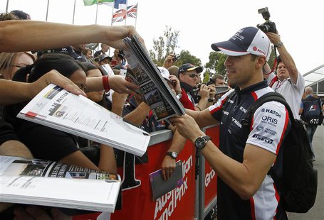 Williams Formula One driver Pastor Maldonado of Venezuela signs autographs after arriving at the Albert Park circuit in Melbourne March 14, Williams Formula One driver Pastor Maldonado of Venezuela signs autographs after arriving at the Albert Park circuit in Melbourne March 14,