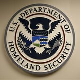 U.S. Department of Homeland Security emblem is pictured at the National Cybersecurity & Communications Integration Center (NCCIC) located ju U.S. Department of Homeland Security emblem is pictured at the National Cybersecurity & Communications Integration Center (NCCIC) located ju