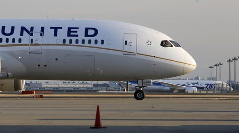 A United Airlines' Boeing Co's 787 Dreamliner plane (front) taxis after landing following its flight from Los Angeles, in front of an All Ni A United Airlines' Boeing Co's 787 Dreamliner plane (front) taxis after landing following its flight from Los Angeles, in front of an All Ni
