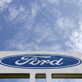 The logo of Ford Motor Co is seen at the company's assembly plant after an emergency meeting with the plant management in Genk October 24, 2