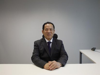 Universal Entertainment Corporation CEO Kazuo Okada poses during an interview in Hong Kong October 30, 2012. REUTERS/Bobby Yip Universal Entertainment Corporation CEO Kazuo Okada poses during an interview in Hong Kong October 30, 2012. REUTERS/Bobby Yip