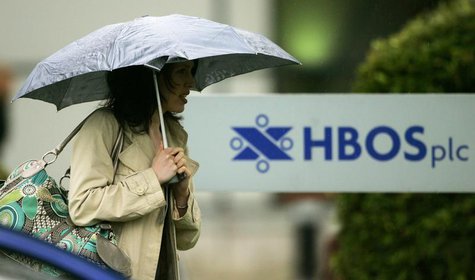 A worker leaves HBOS offices, in Edinburgh, Scotland on September 18, 2008. REUTERS/David Moir A worker leaves HBOS offices, in Edinburgh, Scotland on September 18, 2008. REUTERS/David Moir