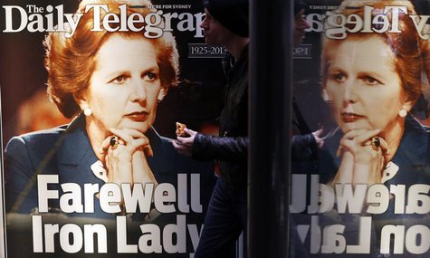 A man walks in front of a newspaper advertisement with the portrait of former British prime minister Margaret Thatcher in Sydney April 9, 20 A man walks in front of a newspaper advertisement with the portrait of former British prime minister Margaret Thatcher in Sydney April 9, 20