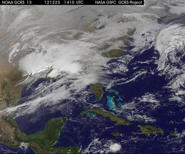 Storm clouds are seen on the east coast of the United States in this NASA handout satellite image taken at 1415 GMT, December 25, 2012. REUT Storm clouds are seen on the east coast of the United States in this NASA handout satellite image taken at 1415 GMT, December 25, 2012. REUT