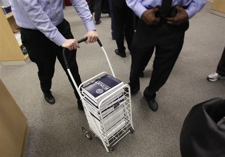 People buy copies of the Fiscal Year 2014 Budget on the first day of its release and distribution at the Government Printing Office in Washi People buy copies of the Fiscal Year 2014 Budget on the first day of its release and distribution at the Government Printing Office in Washi