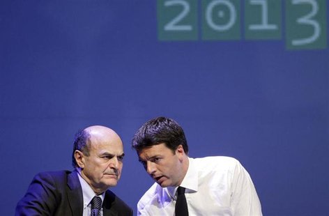 Italian PD (Democratic Party) leader Pierluigi Bersani (L) speaks with mayor of Florence Matteo Renzi during a political rally in Florence F Italian PD (Democratic Party) leader Pierluigi Bersani (L) speaks with mayor of Florence Matteo Renzi during a political rally in Florence F