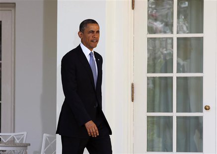 U.S. President Barack Obama walks out before he talks about the Fiscal Year 2014 Budget in the Rose Garden at the White House in Washington, U.S. President Barack Obama walks out before he talks about the Fiscal Year 2014 Budget in the Rose Garden at the White House in Washington,