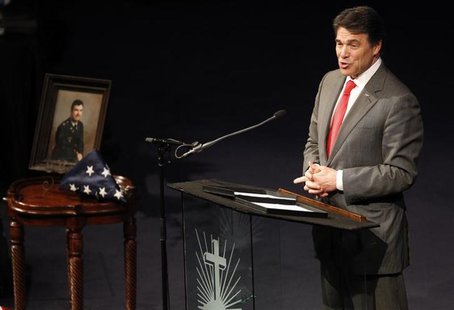 Texas Governor Rick Perry speaks at a memorial service for Kaufman County district attorney Mike McLelland and his wife Cynthia in Sunnyvale Texas Governor Rick Perry speaks at a memorial service for Kaufman County district attorney Mike McLelland and his wife Cynthia in Sunnyvale