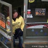 Grand Chute police are working to identify a woman suspected of robbing a convenience store on Sunday, April 7, 2013.