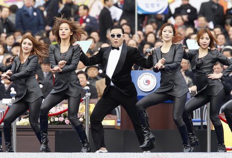 Singer Psy (C) performs during the inauguration of South Korea's President Park Geun-hye (not pictured) at the parliament in Seoul February Singer Psy (C) performs during the inauguration of South Korea's President Park Geun-hye (not pictured) at the parliament in Seoul February