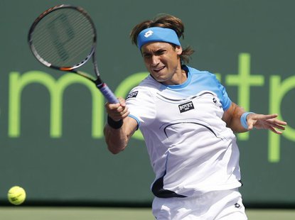 Spain's David Ferrer returns a shot Britain's Andy Murray in their men's singles final match at the Sony Open tennis tournament in Key Bisca Spain's David Ferrer returns a shot Britain's Andy Murray in their men's singles final match at the Sony Open tennis tournament in Key Bisca