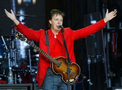 British singer and songwriter Sir Paul McCartney greets spectators at the begining of his concert in the Czech Republic capital of Prague, J British singer and songwriter Sir Paul McCartney greets spectators at the begining of his concert in the Czech Republic capital of Prague, J