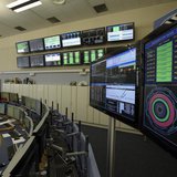 Technicians look at computer screens during the preparation of the beam in the Control Room of the Large Hadron Collider (LHC) at the Europe Technicians look at computer screens during the preparation of the beam in the Control Room of the Large Hadron Collider (LHC) at the Europe