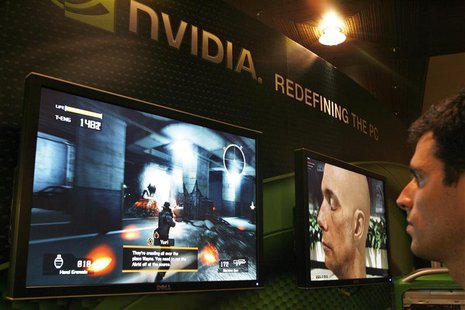 A sales man demonstrates a computer game in a display area of Nvidia Corp. during the second day of the annual 2007 Computex Taipei June 6, A sales man demonstrates a computer game in a display area of Nvidia Corp. during the second day of the annual 2007 Computex Taipei June 6,