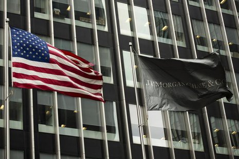 A U.S. and JPMorgan flag fly in front of the headquarters of JPMorgan Chase & Co bank in New York, March 15, 2013. REUTERS/Lucas Jackson A U.S. and JPMorgan flag fly in front of the headquarters of JPMorgan Chase & Co bank in New York, March 15, 2013. REUTERS/Lucas Jackson