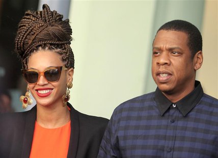 U.S. singer Beyonce (L) and her husband rapper Jay-Z walk as they leave their hotel in Havana in this April 4, 2013 file photo. REUTERS/Enri U.S. singer Beyonce (L) and her husband rapper Jay-Z walk as they leave their hotel in Havana in this April 4, 2013 file photo. REUTERS/Enri