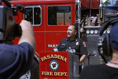 Pasadena fire captain Art Hurtado talks to reporters about saving a man who intentionally cut off his own arms in a Home Depot store, at a n Pasadena fire captain Art Hurtado talks to reporters about saving a man who intentionally cut off his own arms in a Home Depot store, at a n