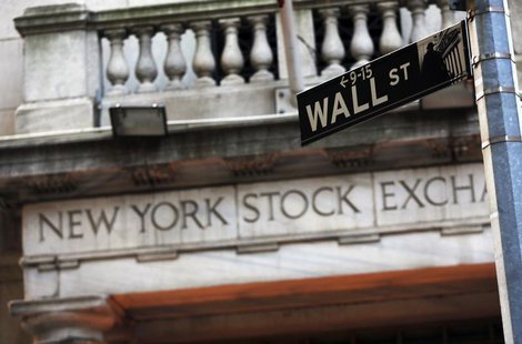 A Wall Street sign is seen in front of the New York Stock Exchange in New York's financial district, March 4, 2013. REUTERS/Brendan McDermid A Wall Street sign is seen in front of the New York Stock Exchange in New York's financial district, March 4, 2013. REUTERS/Brendan McDermid