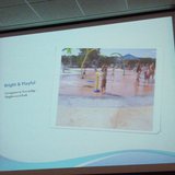 A slide of the splash pad at Maplewood Park in Jenison is shown during a public hearing at the Howard Miller Center on Apr. 11, 2013 into a proposed splash pad for downtown Zeeland.