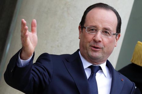 French President Francois Hollande stands on the steps of the Elysee Palace in Paris, April 11, 2013. REUTERS/Philippe Wojazer French President Francois Hollande stands on the steps of the Elysee Palace in Paris, April 11, 2013. REUTERS/Philippe Wojazer
