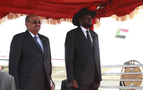Sudan's President Omar Hassan al-Bashir (L) and his South Sudan counterpart Salva Kiir listen to their national anthems upon his arrival at Sudan's President Omar Hassan al-Bashir (L) and his South Sudan counterpart Salva Kiir listen to their national anthems upon his arrival at