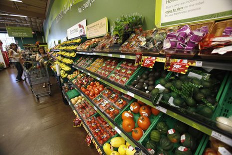 Shoppers stand by the vegetables aisle inside a Fresh & Easy store in Burbank, California October 19, 2012. REUTERS/Mario Anzuoni Shoppers stand by the vegetables aisle inside a Fresh & Easy store in Burbank, California October 19, 2012. REUTERS/Mario Anzuoni