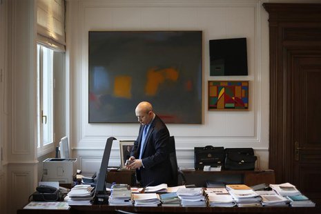 Spain's Education Minister Jose Ignacio Wert checks his mobile phone during an interview with Reuters at his office in Madrid April 9, 2013. Spain's Education Minister Jose Ignacio Wert checks his mobile phone during an interview with Reuters at his office in Madrid April 9, 2013.