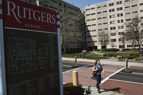 A woman walks at the campus after Rutgers University President Robert Barchi held a town hall meeting to students and people in Newark, New A woman walks at the campus after Rutgers University President Robert Barchi held a town hall meeting to students and people in Newark, New