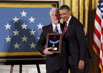 U.S. President Barack Obama participates in a Medal of Honor ceremony for U.S. Army Chaplain Emil Kapaun, accepted posthumously by his nephe U.S. President Barack Obama participates in a Medal of Honor ceremony for U.S. Army Chaplain Emil Kapaun, accepted posthumously by his nephe