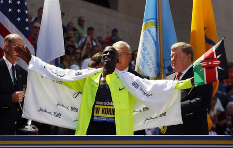 Wesley Korir of Kenya reacts as he gets his medal after winning the men's division of the 116th Boston Marathon in Boston, Massachusetts Apr Wesley Korir of Kenya reacts as he gets his medal after winning the men's division of the 116th Boston Marathon in Boston, Massachusetts Apr