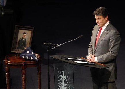 Texas Governor Rick Perry speaks at a memorial service for Kaufman County district attorney Mike McLelland and his wife Cynthia in Sunnyvale Texas Governor Rick Perry speaks at a memorial service for Kaufman County district attorney Mike McLelland and his wife Cynthia in Sunnyvale