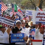 Crowds of immigrants protest in favor of comprehensive immigration reform while on the West side of Capitol Hill in Washington, April 10, 20