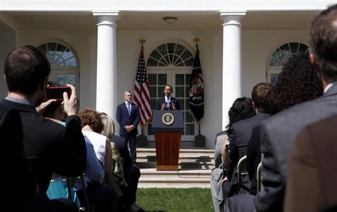 U.S. President Barack Obama talks about the Fiscal Year 2014 Budget while standing next to acting Director of Office of Management and Budge U.S. President Barack Obama talks about the Fiscal Year 2014 Budget while standing next to acting Director of Office of Management and Budge
