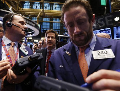 Traders work on the floor at the New York Stock Exchange, April 12, 2013. REUTERS/Brendan McDermid Traders work on the floor at the New York Stock Exchange, April 12, 2013. REUTERS/Brendan McDermid