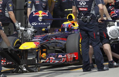Red Bull Formula One driver Mark Webber of Australia stops in the pit lane during the qualifying session for the Chinese F1 Grand Prix at th Red Bull Formula One driver Mark Webber of Australia stops in the pit lane during the qualifying session for the Chinese F1 Grand Prix at th