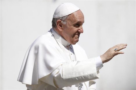 Pope Francis waves as he leads the weekly audience in Saint Peter's Square at the Vatican April 10, 2013. REUTERS/Giampiero Sposito Pope Francis waves as he leads the weekly audience in Saint Peter's Square at the Vatican April 10, 2013. REUTERS/Giampiero Sposito