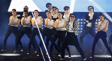 South Korean rapper Psy performs "Gentleman" during his concert "Happening" in Seoul April 13, 2013. REUTERS/Lee Jae-Won South Korean rapper Psy performs "Gentleman" during his concert "Happening" in Seoul April 13, 2013. REUTERS/Lee Jae-Won