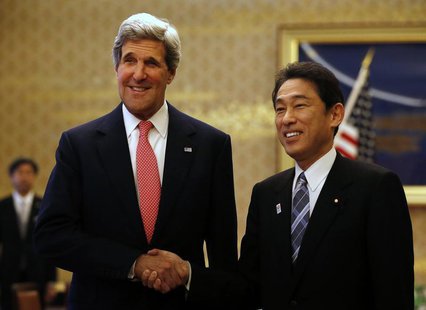 U.S. Secretary of State John Kerry (L) shakes hands with Japan's Foreign Minister Fumio Kishida during their meeting at the Iikura Guest Hou U.S. Secretary of State John Kerry (L) shakes hands with Japan's Foreign Minister Fumio Kishida during their meeting at the Iikura Guest Hou