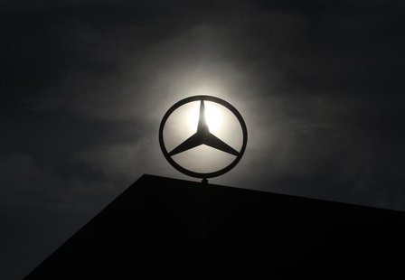 The logo of Mercedes Benz is seen on top of a car factory against the background of an overcast sky in the central Hungarian town of Kecskem The logo of Mercedes Benz is seen on top of a car factory against the background of an overcast sky in the central Hungarian town of Kecskem