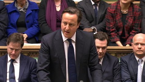 Britain's Prime Minister David Cameron (2nd L), flanked by (L-R) Deputy Prime Minister Nick Clegg, Chancellor of the Exchequer George Osborn Britain's Prime Minister David Cameron (2nd L), flanked by (L-R) Deputy Prime Minister Nick Clegg, Chancellor of the Exchequer George Osborn