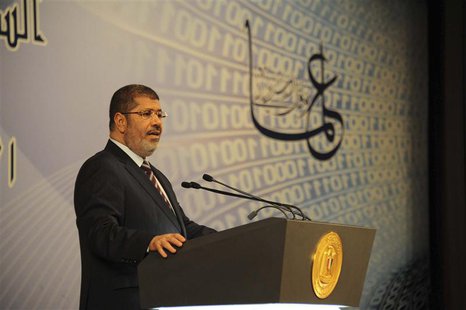 Egypt's President Mohamed Mursi speaks during an event marking Science Day in Cairo April 11, 2013 in this picture provided by the Egyptian Egypt's President Mohamed Mursi speaks during an event marking Science Day in Cairo April 11, 2013 in this picture provided by the Egyptian