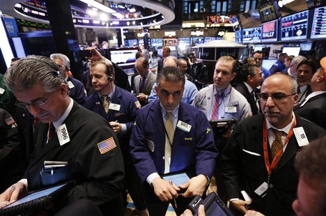 Traders work on the floor at the New York Stock Exchange, April 12, 2013. REUTERS/Brendan McDermid Traders work on the floor at the New York Stock Exchange, April 12, 2013. REUTERS/Brendan McDermid