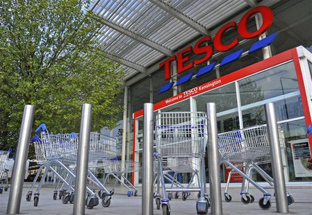 Shopping trolleys are seen in front of a Tesco store in Kensington, west London in this April 19, 2011 file photo. REUTERS/Toby Melville/Fil Shopping trolleys are seen in front of a Tesco store in Kensington, west London in this April 19, 2011 file photo. REUTERS/Toby Melville/Fil