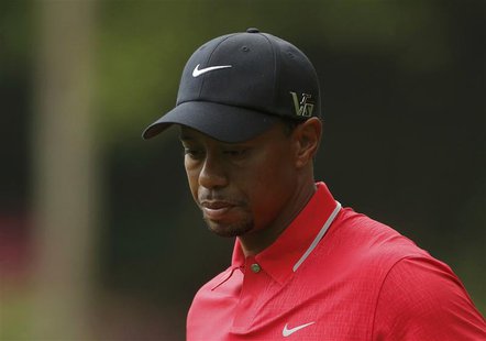 Tiger Woods of the U.S. walks to the 14th tee during final round play in the 2013 Masters golf tournament at the Augusta National Golf Club Tiger Woods of the U.S. walks to the 14th tee during final round play in the 2013 Masters golf tournament at the Augusta National Golf Club