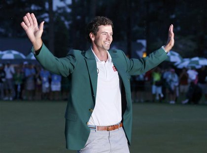 Adam Scott of Australia celebrates with his green jacket after winning the 2013 Masters golf tournament at the Augusta National Golf Club in Adam Scott of Australia celebrates with his green jacket after winning the 2013 Masters golf tournament at the Augusta National Golf Club in