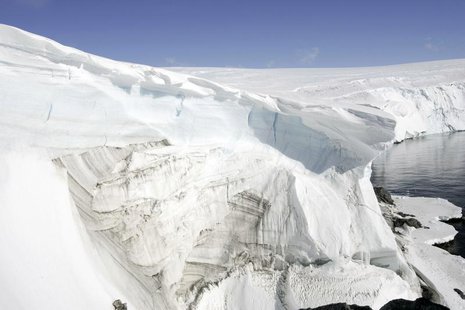 Ice melt shows through at a cliff face at Landsend on the coast of Cape Denison in Antarctica December 14, 2009. REUTERS/Pauline Askin Ice melt shows through at a cliff face at Landsend on the coast of Cape Denison in Antarctica December 14, 2009. REUTERS/Pauline Askin