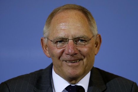 Germany's Finance Minister Wolfgang Schaeuble smiles as he addresses a news conference in Berlin March 25, 2013. REUTERS/Fabrizio Bensch Germany's Finance Minister Wolfgang Schaeuble smiles as he addresses a news conference in Berlin March 25, 2013. REUTERS/Fabrizio Bensch
