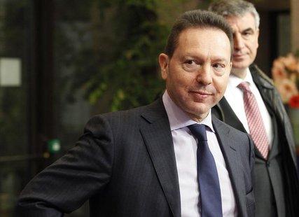 Greece's Finance Minister Yiannis Stournaras arrives for a Eurogroup meeting at the European Council building in Brussels March 24, 2013. RE Greece's Finance Minister Yiannis Stournaras arrives for a Eurogroup meeting at the European Council building in Brussels March 24, 2013. RE