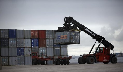 A worker unloads a container using a forklift at a port in Lisbon March 12, 2013. REUTERS/Rafael Marchante A worker unloads a container using a forklift at a port in Lisbon March 12, 2013. REUTERS/Rafael Marchante
